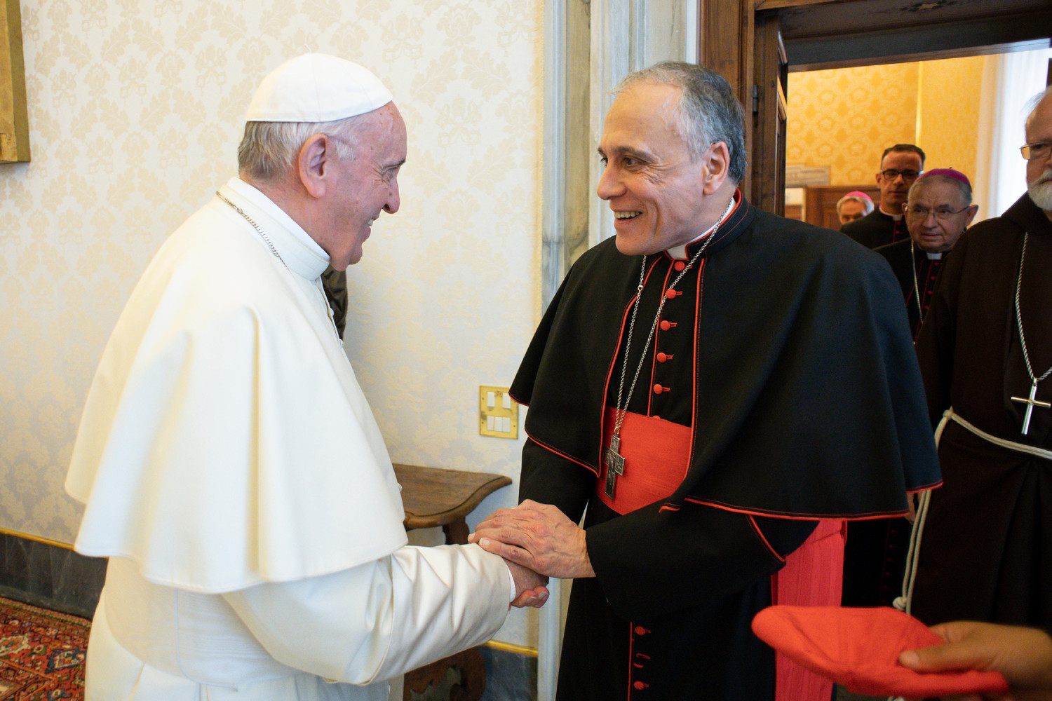 Pope Francis greets Cardinal Daniel N. DiNardo of Galveston-Houston, president of the U.S. Conference of Catholic Bishops, during a meeting with officials of the conference at the Vatican Sept. 13. Also pictured are Cardinal Sean P. O’Malley of Boston, president of the Pontifical Commission for the Protection of Minors, Archbishop Jose H. Gomez of Los Angeles, vice president of the conference, and Msgr. J. Brian Bransfield, general secretary of the conference.